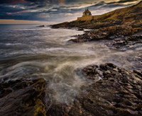 Rumbling Kern. A long shutter speed and small aperture made sure all the rocks were sharp but the sea recorded as a blur.